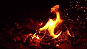 Glowing campfire at night