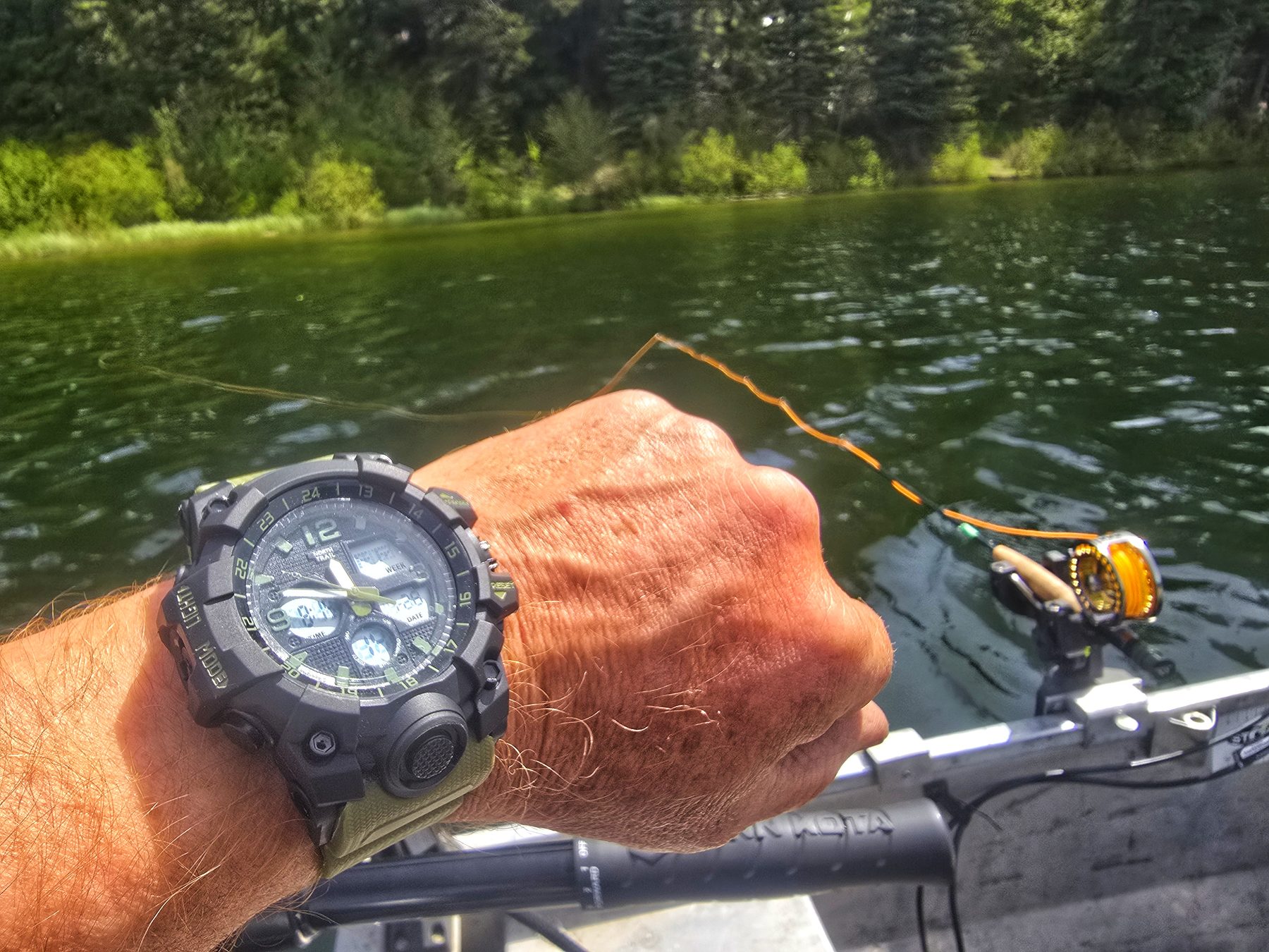 Watch and rod holder view on the water